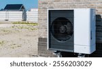 air source heat pump mounted on a building exterior in the Netherlands, complementing the backdrop of an active construction site under a bright blue sky. warmte pomp translation air source heat pump