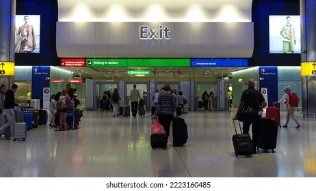 Air Travellers Pass Through Customs Channels While Exciting Heathrow Airport On August 22, 2019 In London, UK. Great Britain's Heathrow Is The Busiest Airport In Europe By Passenger Volume.