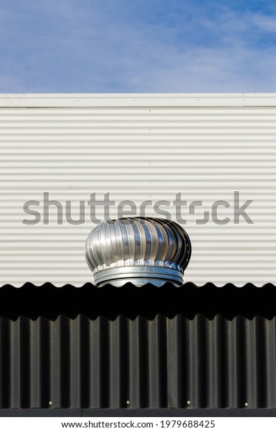 Air vent on a metal sheet\
roof
