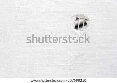 air vent in a white wall