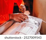 Air worker technician is installing electrical wires in Fan Coil Unit, Air conditioning technicians Prepare to  install new air conditioner in homes