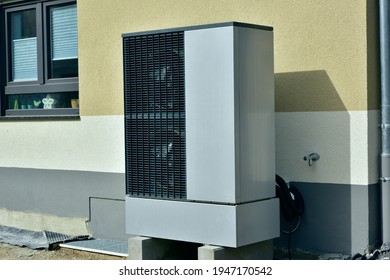 Air-Air Heat Pump For Heating And Hot Water In Front Of An Residential Building