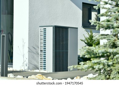 Air-Air Heat Pump For Heating And Hot Water In Front Of An Residential Building