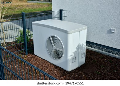 Air-Air Heat Pump For Heating And Hot Water In Front Of An Residential Building