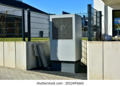 Air-Air Heat Pump For Heating And Hot Water In Front Of An Residential Building