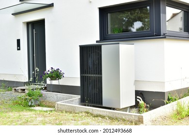 Air-Air Heat Pump For Heating And Hot Water In Front Of An Residential Building