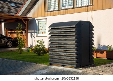 Air-Air Heat Pump For Heating And Hot Water In Front Of A Residential Building