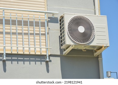 Air-Air Heat Pump For Heating And Hot Water In Front Of A Residential Building