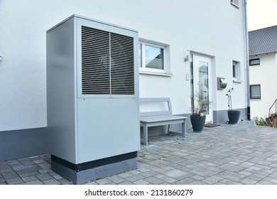 Air-Air Heat PumpAir conditioner for Heating and hot Water, Carport and Garbage Collection System in Front of an Residential Building