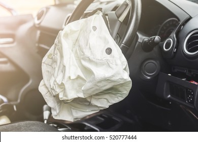 Airbag exploded at a car accident and illuminated - Shutterstock ID 520777444