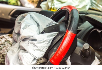 Airbag exploded at a car accident,Car crash and airbag working - Shutterstock ID 1061173454