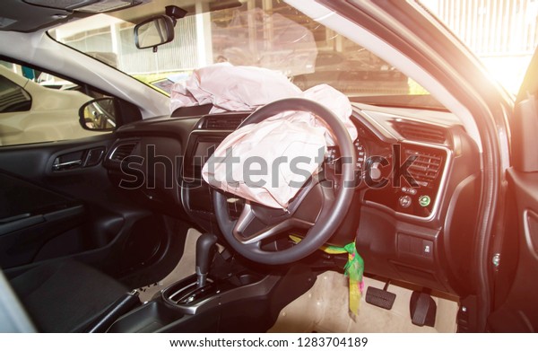 Airbag exploded at a car accident,Car Crash and air\
bag  with light