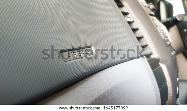 airbag text\
logo on the car front panel\
background.