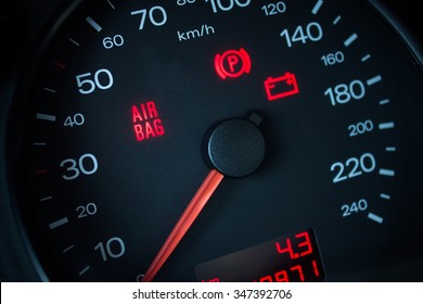 Airbag warning light. Car dashboard in closeup