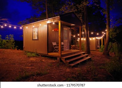 Airbnb Tiny House Cabin Exterior With Christmas Lights In The Blue Ridge Mountains.