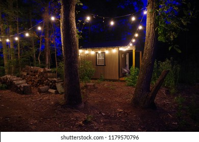 Airbnb Tiny House Cabin Exterior With Christmas Lights In The Blue Ridge Mountains.