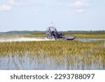 An airboat on the wetland at Lake Tohopekaliga near Orlando, Florida