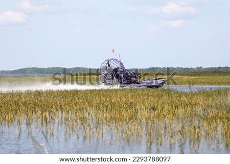 An airboat on the wetland at Lake Tohopekaliga near Orlando, Florida