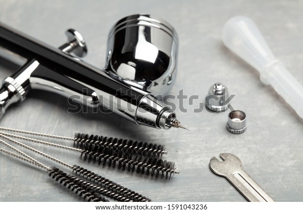 Airbrush cleaning. Brushes and other airbrush\
cleaning tools.