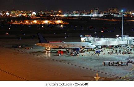 Airbus A-320 Jet At Airport During The Night