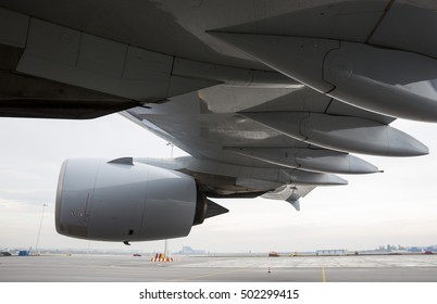 Airbus A380 Airplane's Engine And Wing On A Runway At An Airport. 