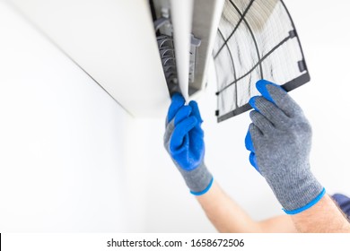 Aircondition Service And Maintenance, Fixing AC Unit And Cleaning The Filters.