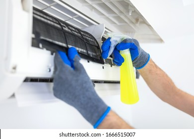 Aircondition Service And Maintenance, Fixing AC Unit And Cleaning The Filters.