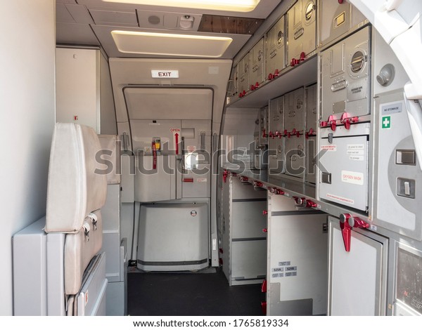 Aircraft aft galley with full of storage\
unit. The most right unit show how it look like.\
