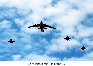 Aircraft of the Airborne Warning And Control System - a mobile, long-range radar surveillance and control complex for air defense - accompanied by  fighters of the Russian Air Force in a group flight - Shutterstock ID 1648012435