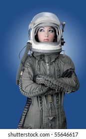 aircraft  astronaut spaceship helmet woman fashion portrait over blue [Photo Illustration]