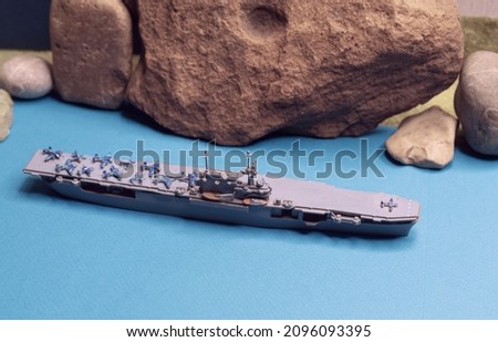 Aircraft carrier model. Board games for children. Assembling versions of aircraft carrier models for a war game