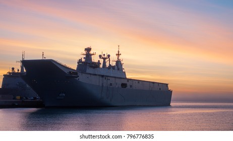 An Aircraft Carrier Moored In A Spanish  Naval Base In Cadiz. The 