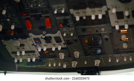 Aircraft Dashboard Command In Empty Plane Cockpit Used To Fly With Engine Throttle And Power Speed. Control Panel Buttons And Lever Fot Navigation With Radar Compass And Windscreen. Close Up.