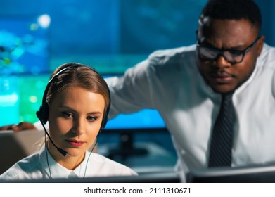 Aircraft Flight Control Officer Monitors The Approach Of Aircraft From Control Tower. Air Services Office Is Equipped With Navigation Systems, Radars And Computer Stations. Aviation Concept.