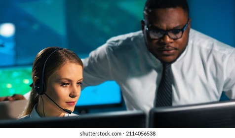 Aircraft Flight Control Officer Monitors The Approach Of Aircraft From Control Tower. Air Services Office Is Equipped With Navigation Systems, Radars And Computer Stations. Aviation Concept.