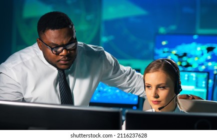 Aircraft Flight Control Officer Monitors The Approach Of Aircraft From Control Tower. Air Services Office Is Equipped With Navigation Systems, Radars And Computer Stations. Aviation Concept.