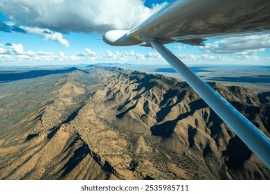 Aircraft flying over the Flinders Ranges, South Austrlaia - Powered by Shutterstock