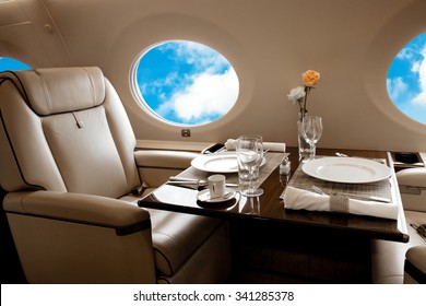 Aircraft (jet) porthole with blue sky view, flight by business class
