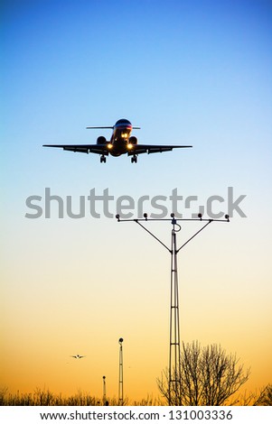 Similar – Flugzeug im Sonnenuntergang