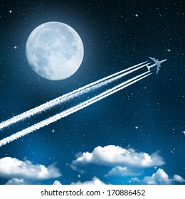 aircraft on night sky with moon 
