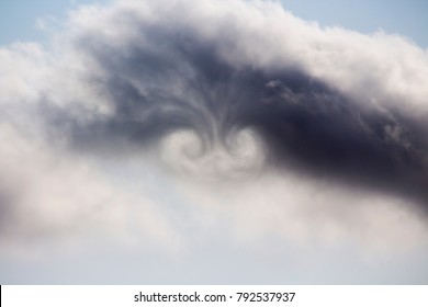 Aircraft Passing  In The Cloud With Wake Turbulence