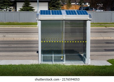 Airdrie Alberta Canada, July 9 2022: A Solar Bus Shelter Producing Clean Energy For Public Transit In A Sustainable Community.