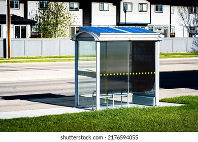 Airdrie Alberta Canada, July 9 2022: A Solar Bus Shelter Producing Clean Energy For Public Transit In A Sustainable Community.