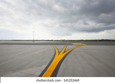 Airfield - marking on taxiway is heading to runway.