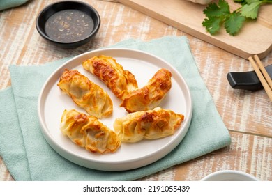 Airfryer Gyoza,Use Air Fryer Grilled Dumplings Pork And Vegetables On White Plate