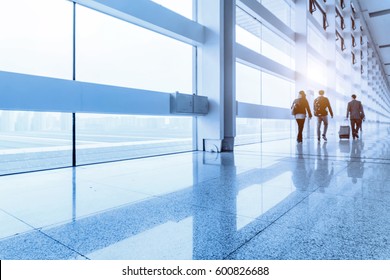 Airline Passengers At The Airport