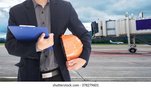 Airline Safety Engineer Going Through A Pre-flight Checklist