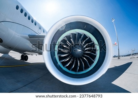 Airliner engine close-up showing the fan blades used in a jet engine. A good aircraft maintenance is important in the airline industry. There are many mro companies maintaining planes.