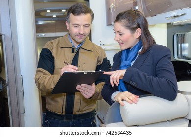 airplan ground technician safety check with flight attendant