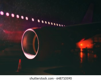 Airplane At Airport. Night Red Eye Flight. Fragment Of The Body Of Aircraft. Business And Travel Concept